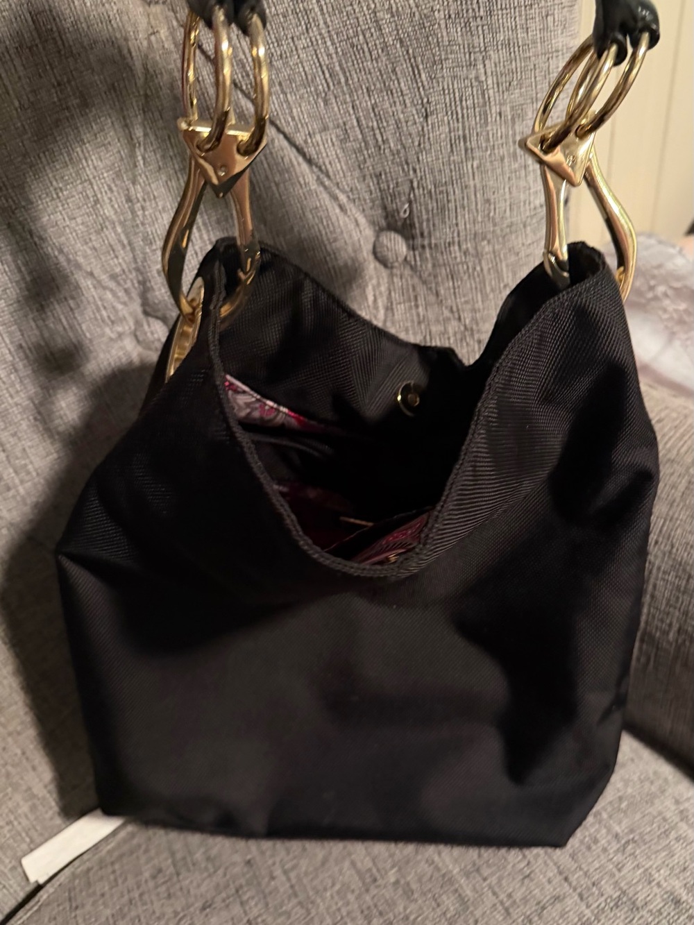 Elegant Black Shoulder Bag with Gold Accent Hardware - Picture 2 of 5
